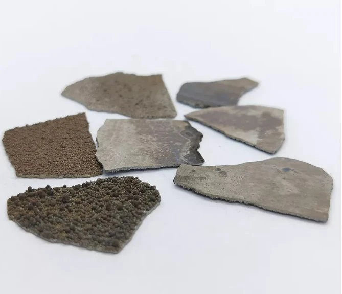 The pretty of Electrolytic Manganese Mn metal flakes The pretty of Electrolytic Manganese Mn metal flakes
